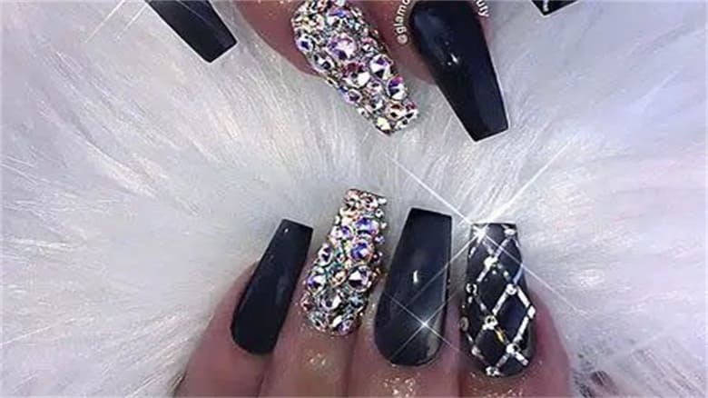 black nails with silver design